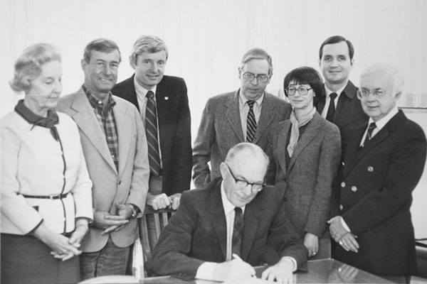 Clark Haines signs Dayton Public Radio into existence